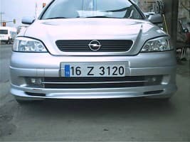 Передняя нижняя накладка Sedan ( под покраску) на Opel Astra G classic 1998-2012